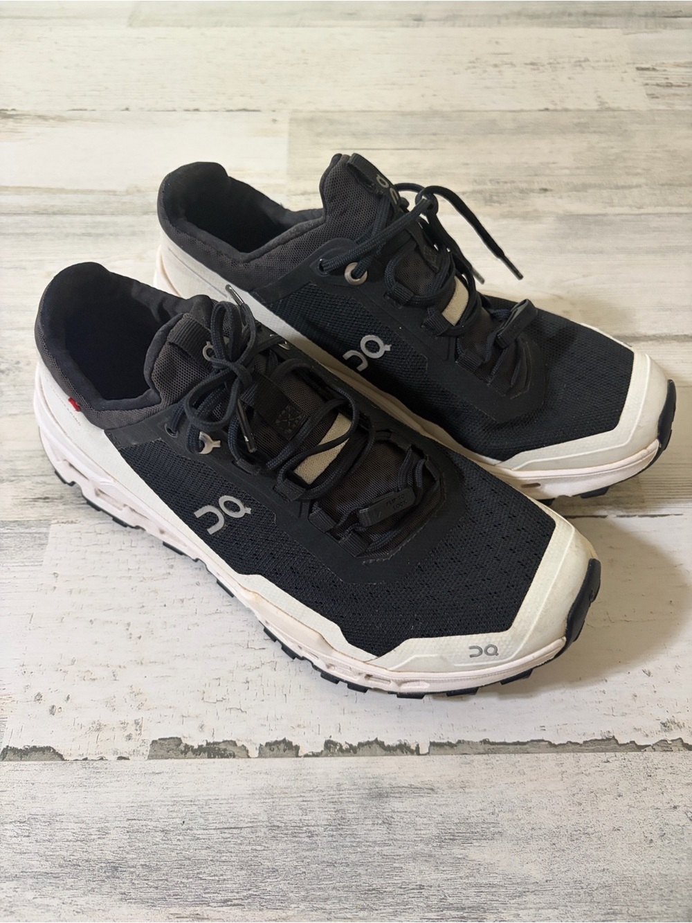 On Running Black and White Women’s Helion Running Shoes